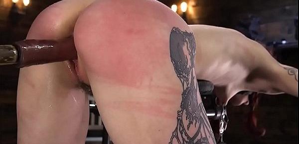  Tattooed slut toyed on device bondage